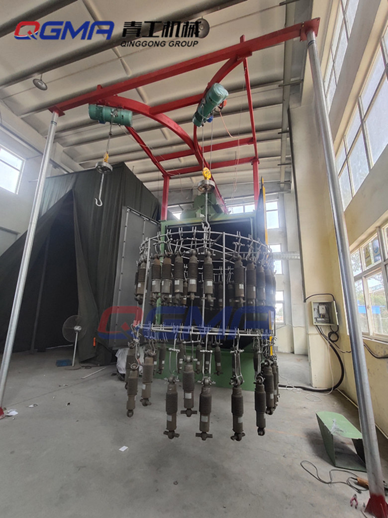 青岛青工机械双吊钩式抛丸机助力于中国中车减震装置抛丸清理